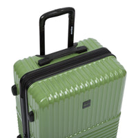 Tonal polycarbonate hardside spinner suitcase in Matcha, close-up of the padded handle