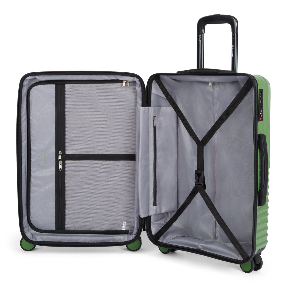 Tonal polycarbonate hardside spinner suitcase in Matcha, open, showing the lined interior and compression straps