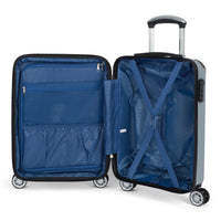 Compact II hardside carry-on spinner suitcase in Silver, open, showing the lined interior and compression straps