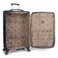 Dawson softside spinner suitcase in Navy, open, showing the lined interior and compression straps