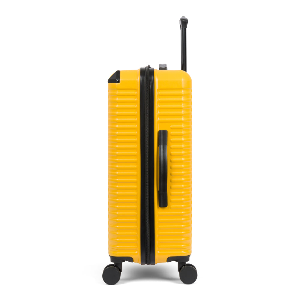 Abrams hardside spinner suitcase in Yellow, side view